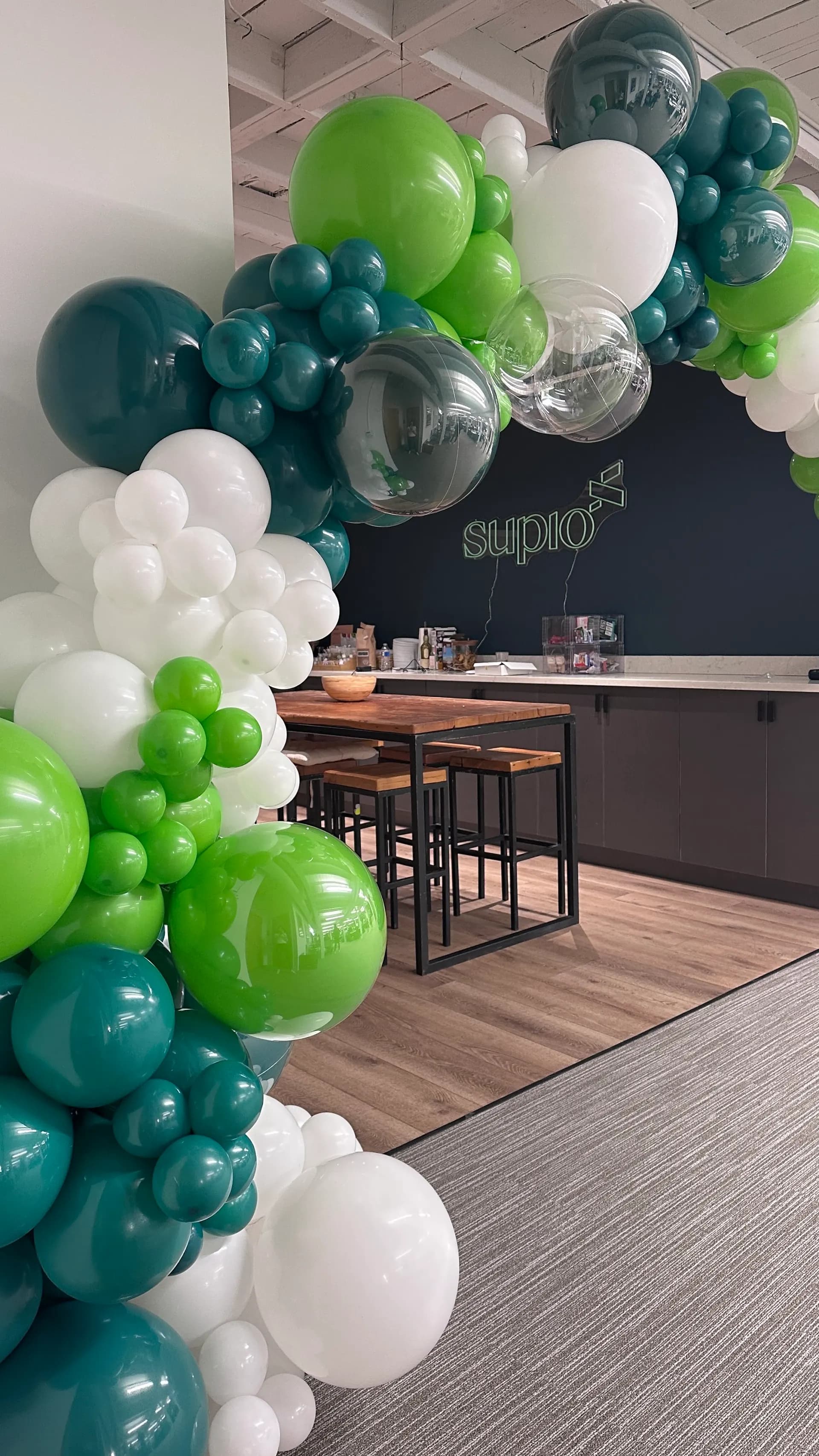 Organic balloon arch installed on site for the Office Grand Opening in Downtown San Francisco, frame 5 of 6.