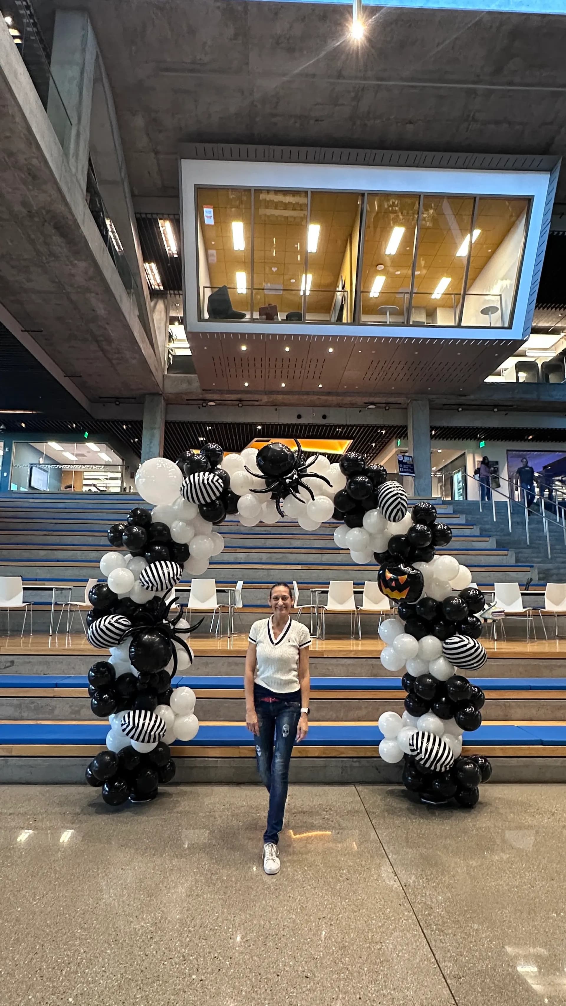 Spider-themed arch and balloon column for Intuit at the Halloween Office Event in Silicon Valley, California.