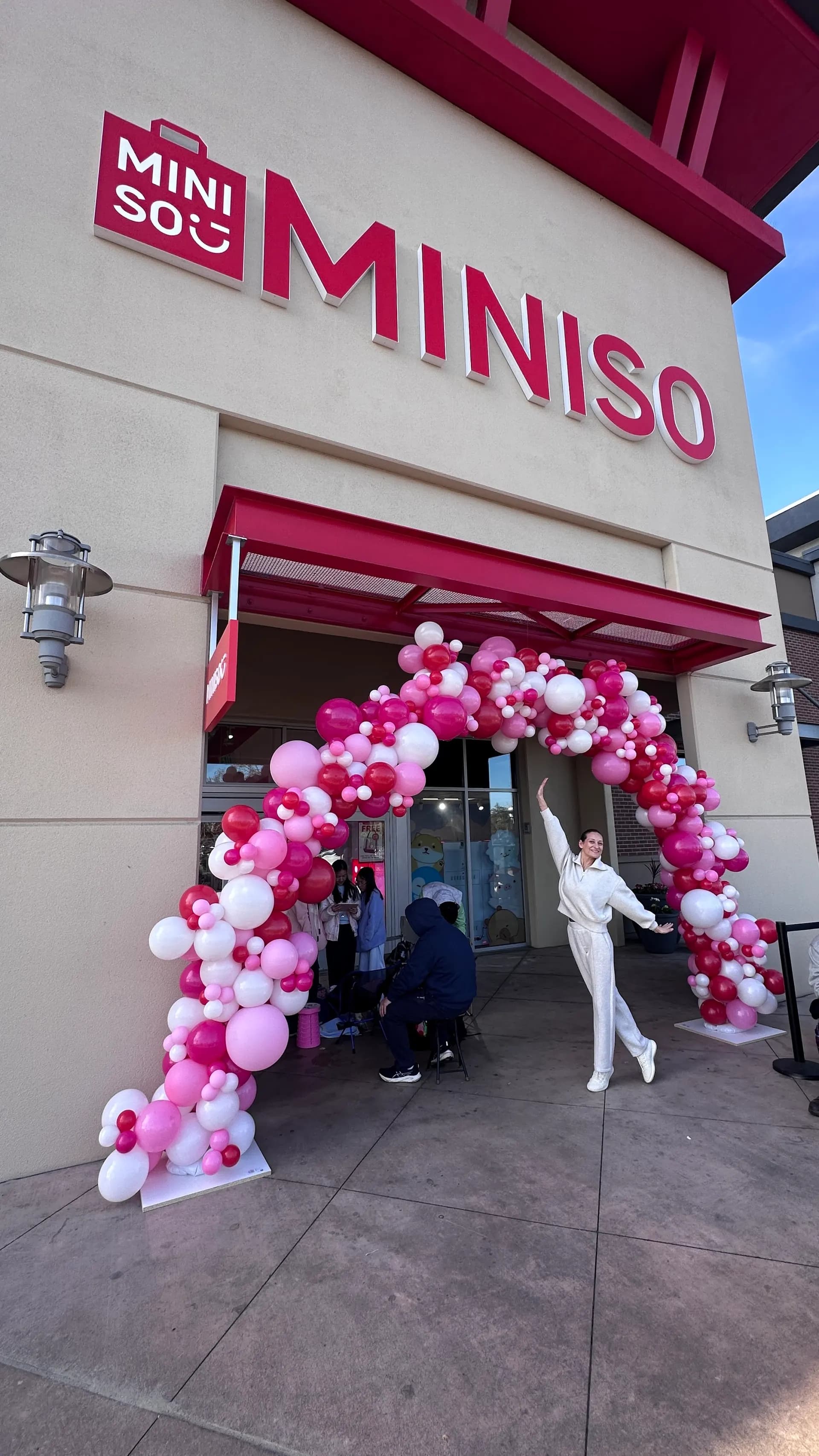 Branded entrance balloon columns installed on site for the Store Grand Opening in San Francisco Bay Area, frame 5 of 5.