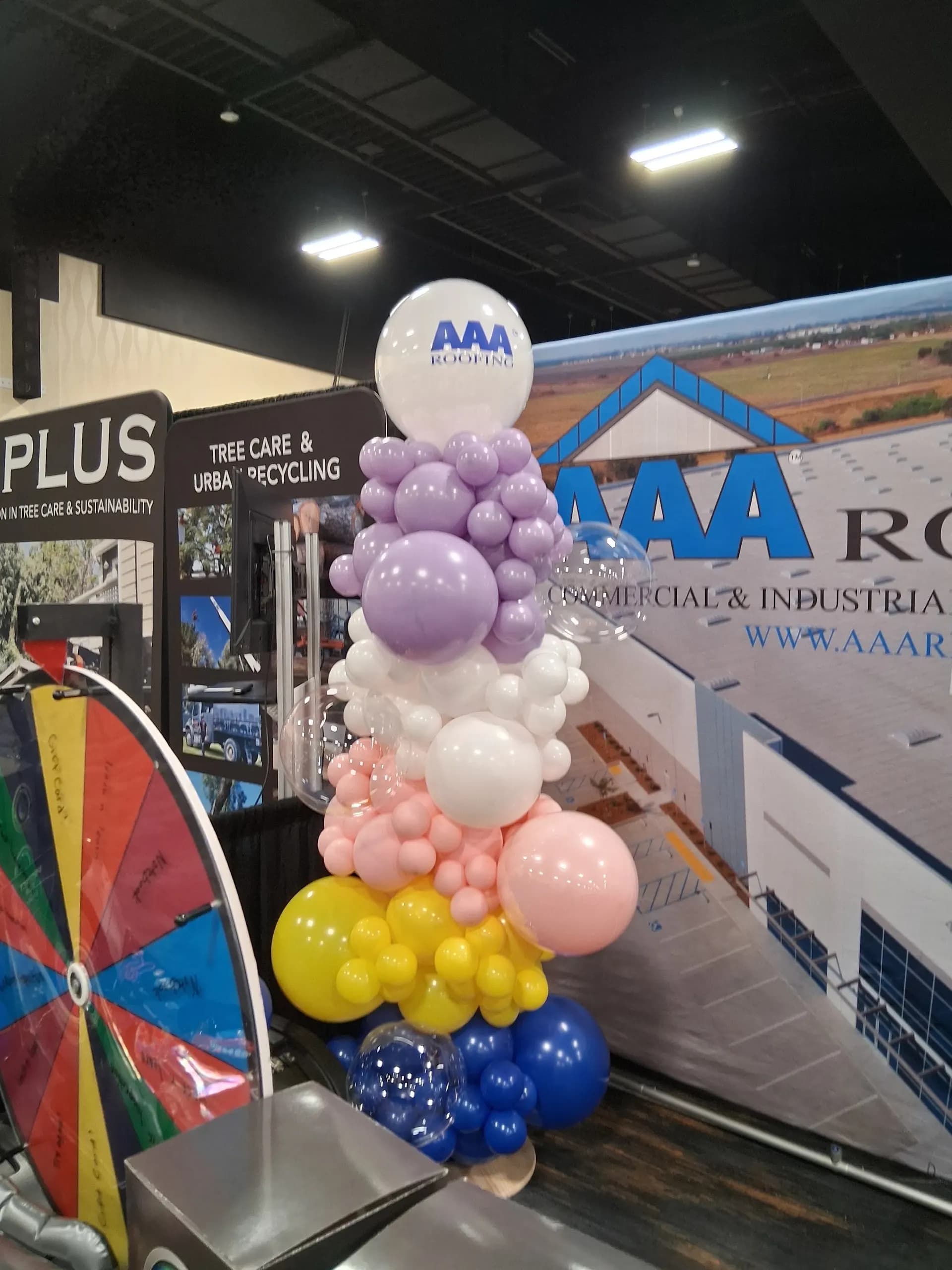 Branded balloon column for AAA Roofing at the Trade Show in San Francisco Bay Area.