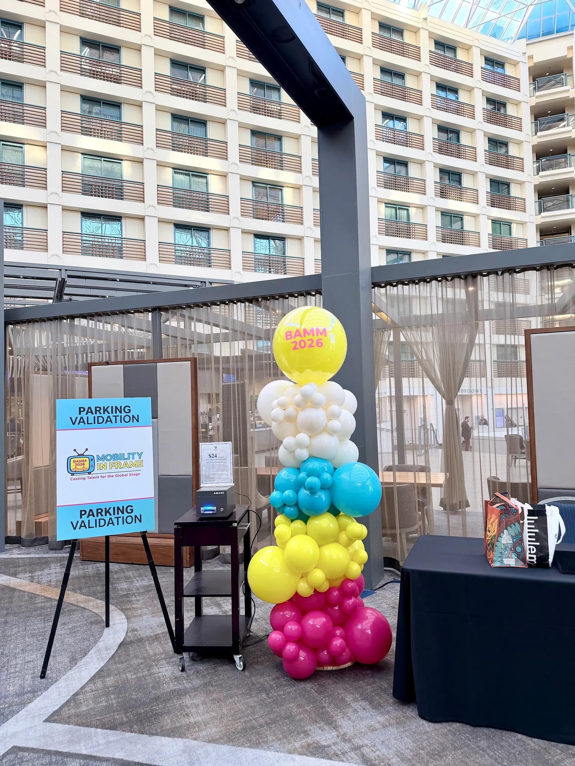 Large-scale corporate balloon installation produced by Balloon Décor for BAMM in Hyatt Regency San Francisco Airport, view 3.