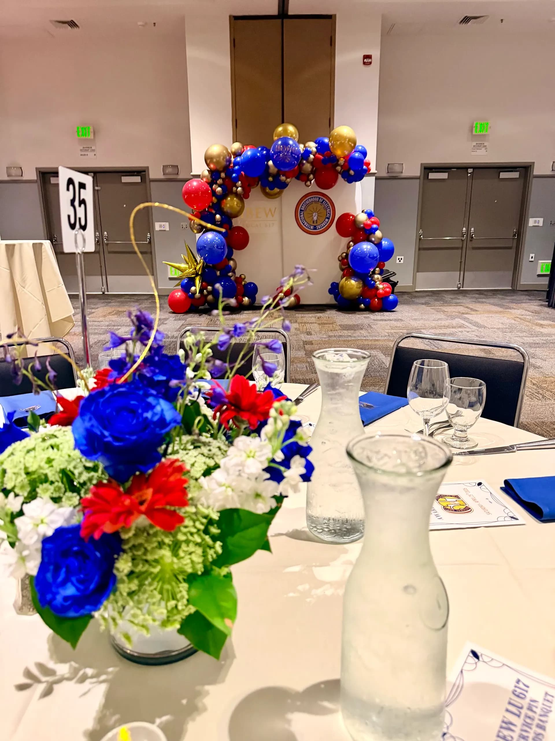Branded balloon backdrop and stage columns for IBEW Local 617 at the Corporate Gala & Conference in San Mateo, California.