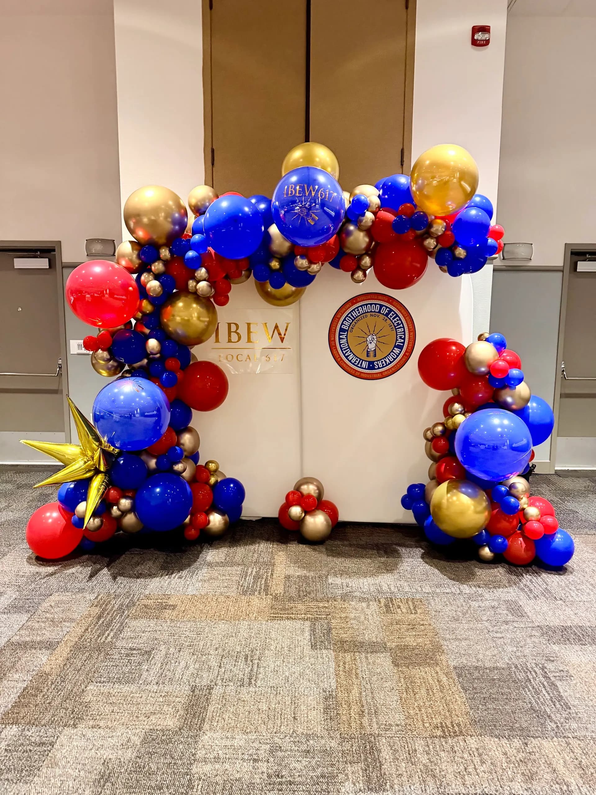 IBEW Local 617's Corporate Gala & Conference in San Mateo, California: branded balloon backdrop and stage columns, view 2 of 8.