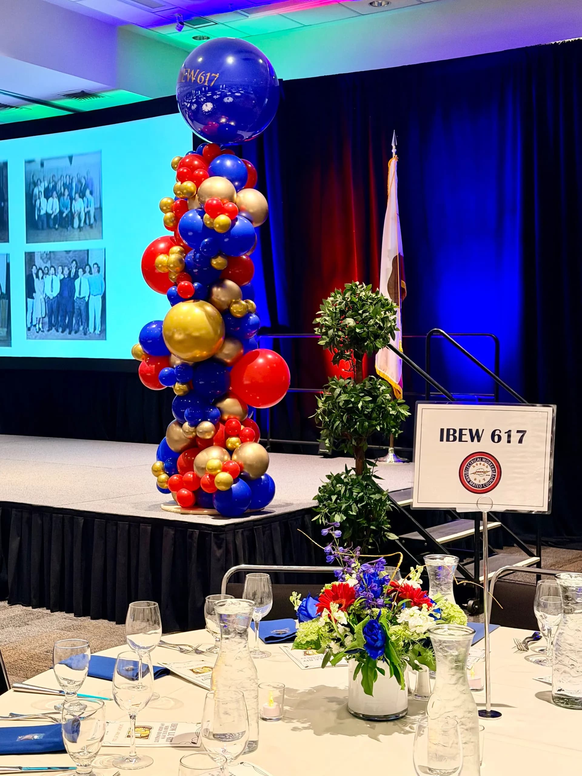 Branded balloon backdrop and stage columns installed on site for the Corporate Gala & Conference in San Mateo, California, frame 5 of 8.