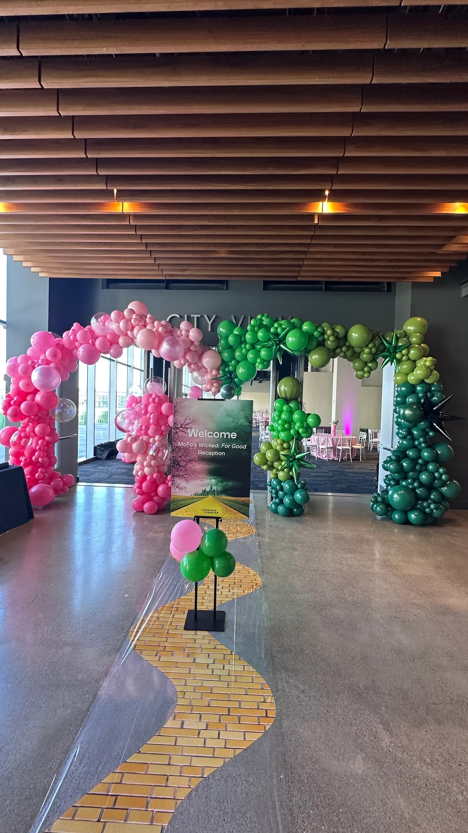 Emerald City and Glinda themed arches and centerpieces at the Themed Corporate Event in San Francisco, California.